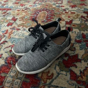 Grey and black TOMS